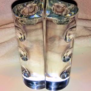 A vintage set of candle holders by OLEG Cassini.